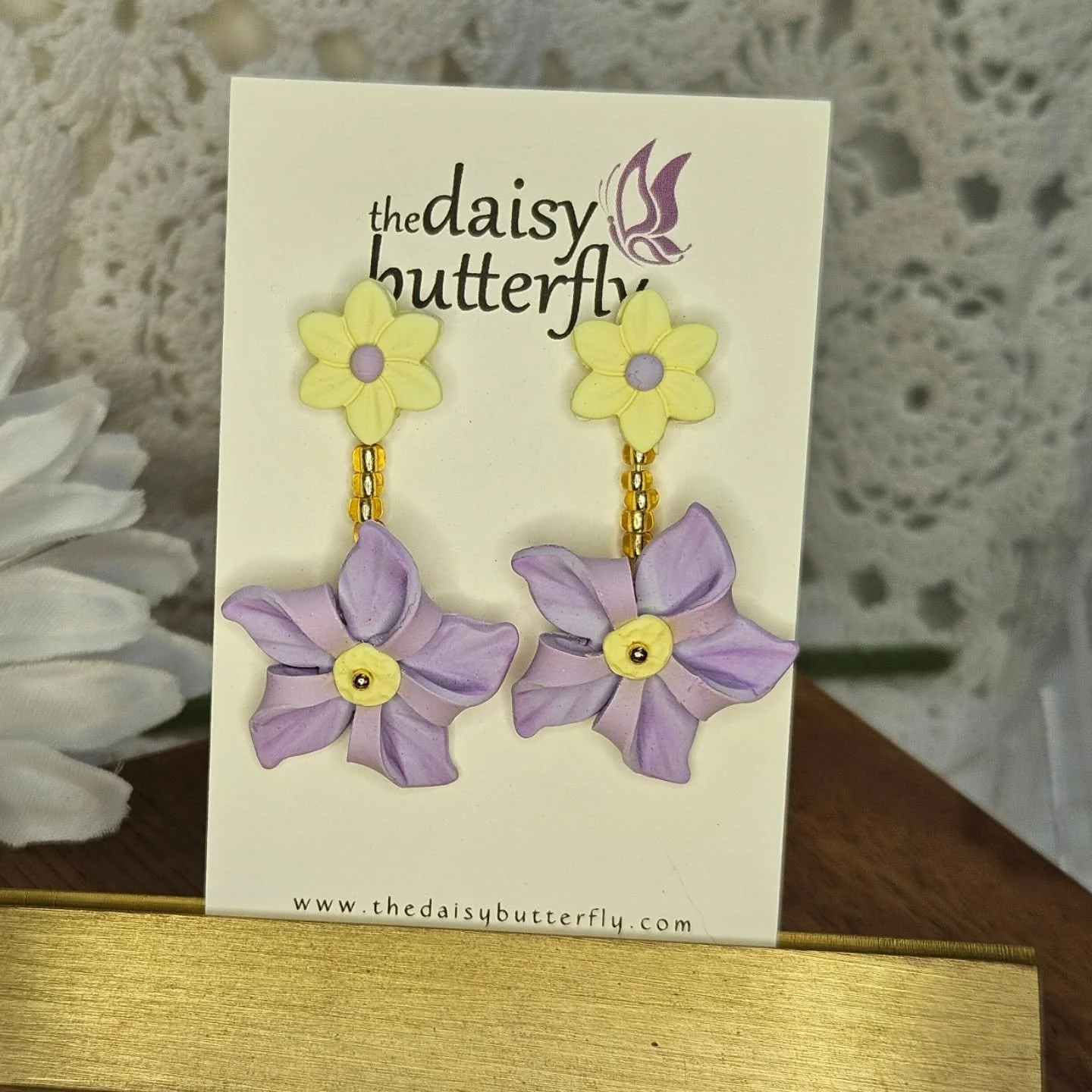 I have no idea why it took me so long but finally spinning flower pinwheels are being added to my signature pinwheel collection. Last fall I made a few pair of sunflower pinwheels for the Whirligig Festival and for some reason it didn't occur to me u