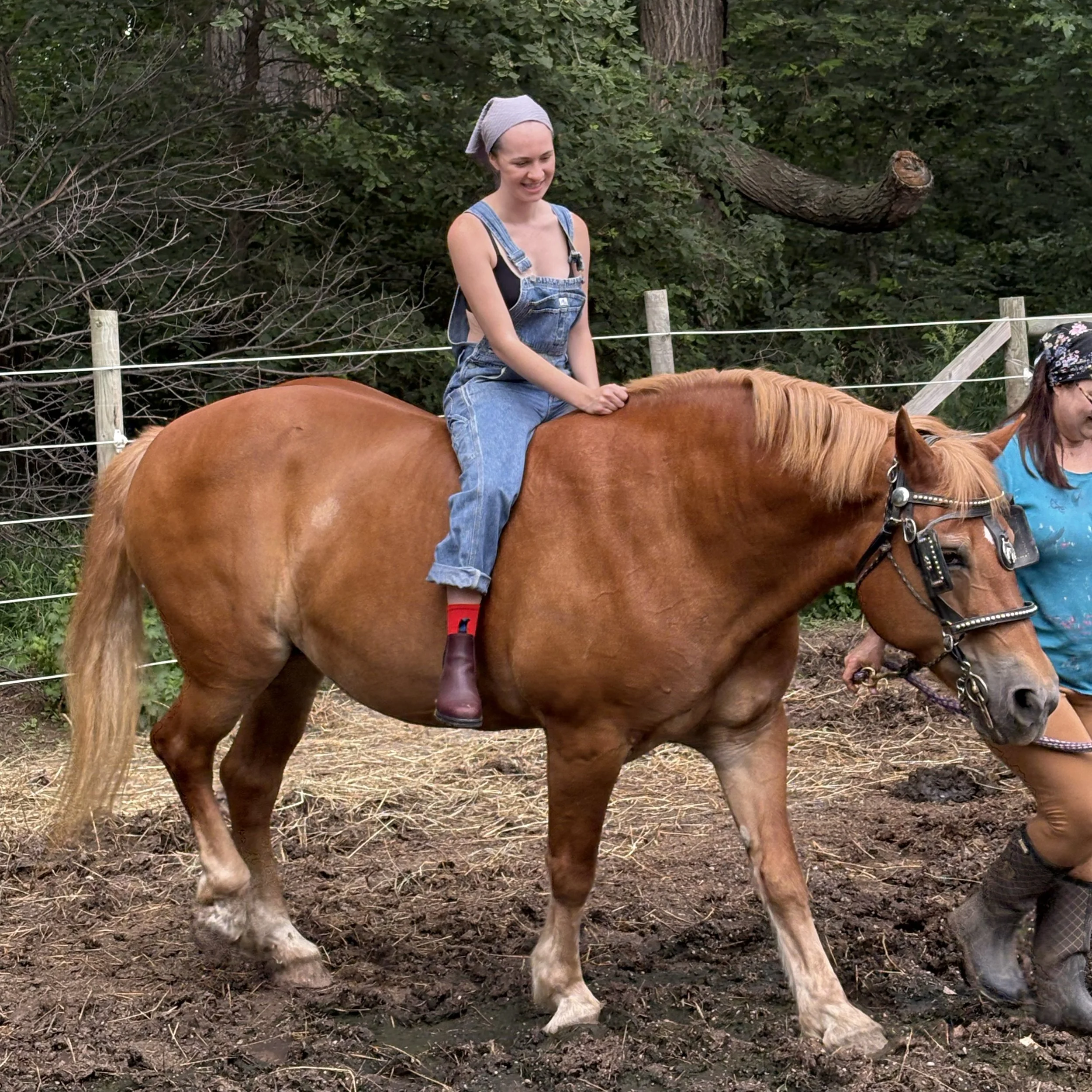 Woman riding bareback.