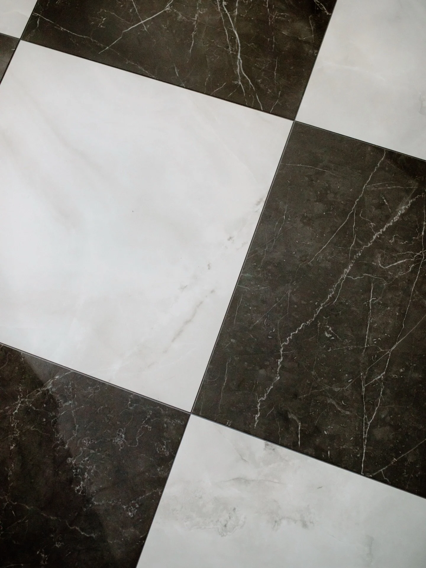 A signature detail we&rsquo;ll never get tired of 🖤

This black and white kitchen floor was bold without being trendy - graphic, high contrast, and effortlessly timeless. It grounded the entire space and set the tone from the moment you walked in, p