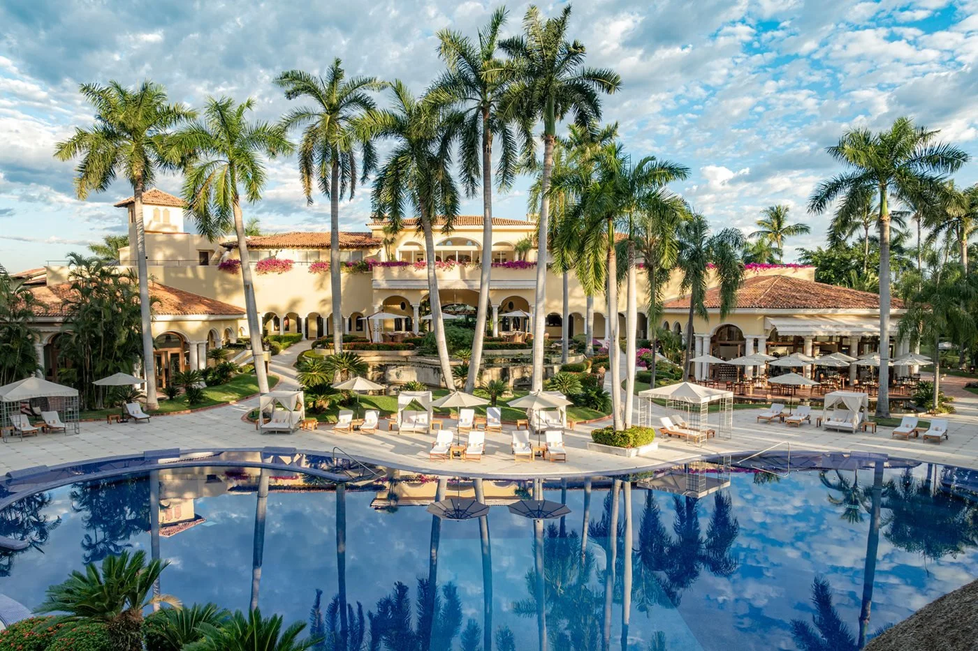 A view of the back of Casa Velas hacienda and its large pool