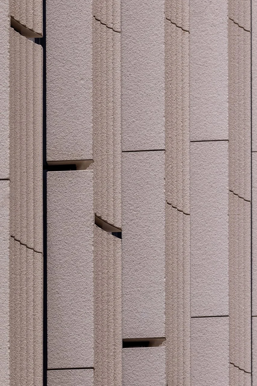 Pink concrete facade at chifley