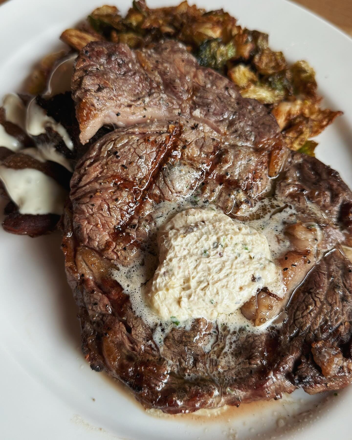 We&rsquo;re serious about our ribeye. 12 oz perfectly marbled Country Natural ribeye, Chef&rsquo;s bone marrow butter, &ldquo;ASMR-crispy&rdquo; potatoes with bleu cheese fondue &amp; fried brussels. An instant favorite.