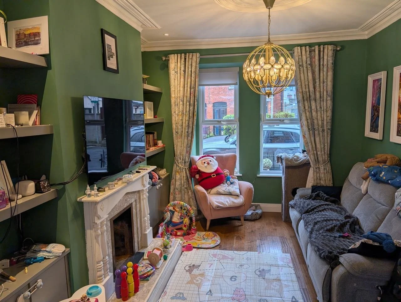 Living room before occupied home staging in Dublin, Ireland, showing lived-in space prior to styling