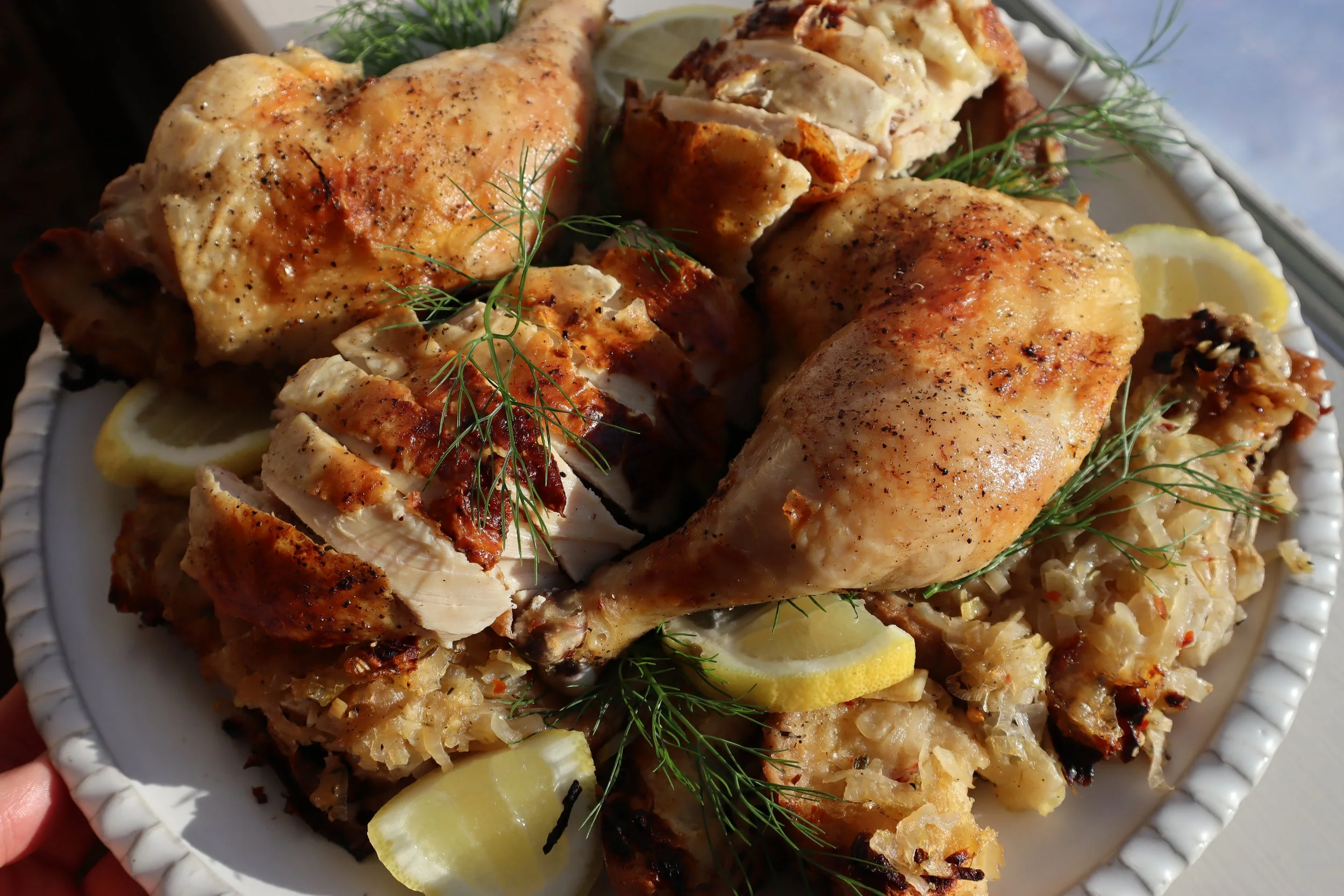 Roasted Lemon Chicken over Baguette, Onion, and Leeks