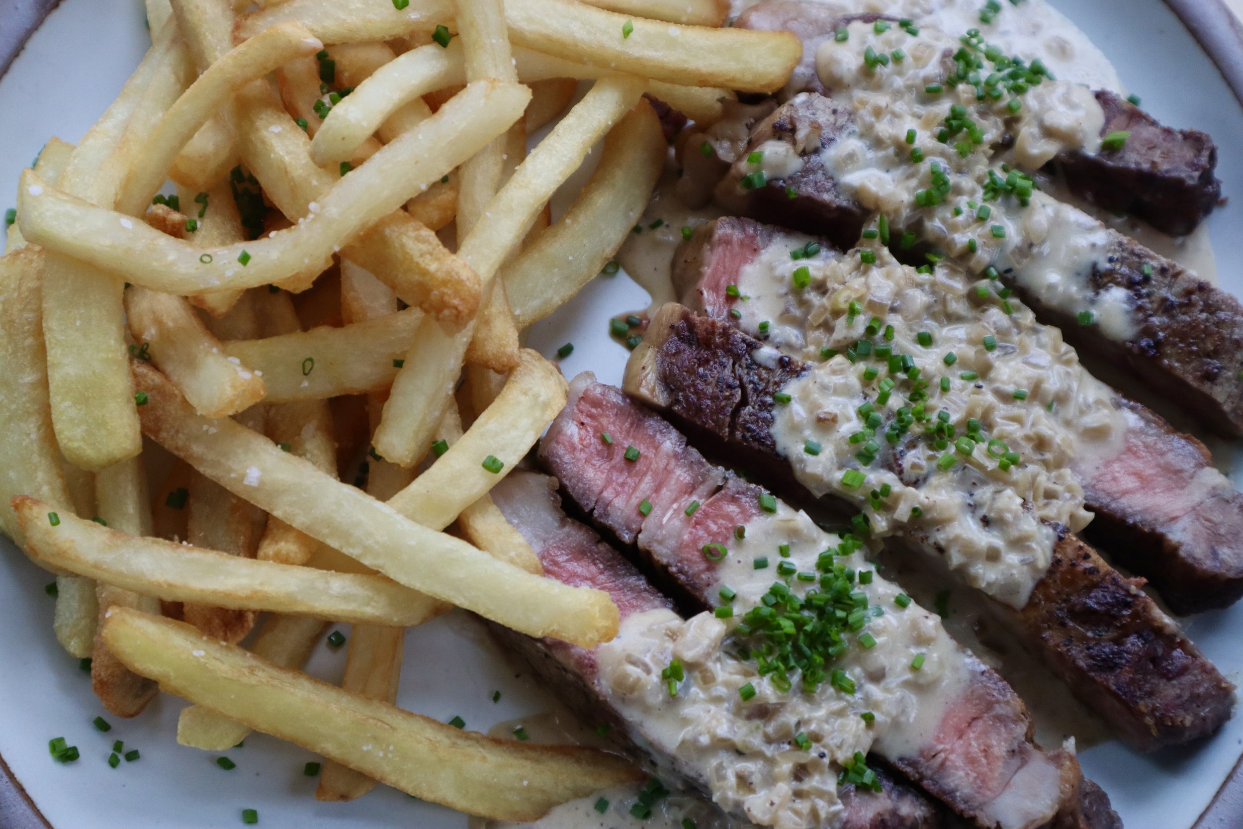 Rich Steak Frites Recipe with a Brandy Cream Sauce and Homemade French Fries