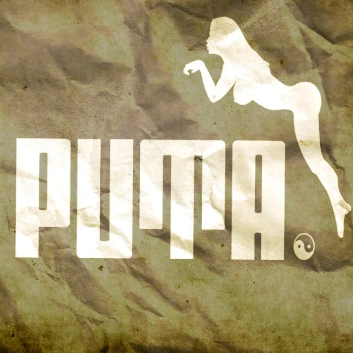 Stylized text reading "PUTA" with a silhouette of a woman and a yin-yang symbol next to it, on a crumpled paper background.