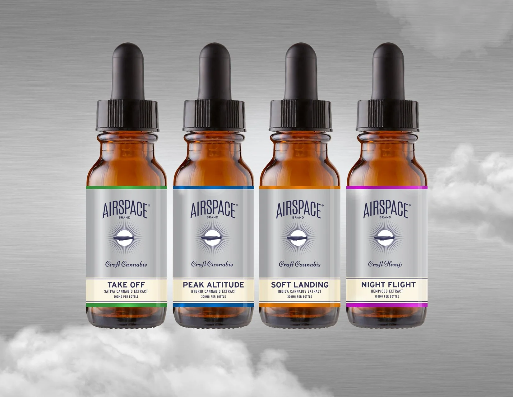 Four amber glass dropper bottles with black caps and white labels displaying the brand name Airspace, each labeled with different cannabis strains and types, against a cloudy sky background.