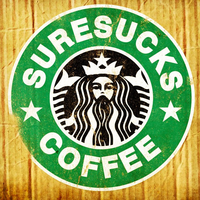 A circular sign resembling a Starbucks logo with the words "Surresucks Coffee" in place of Starbucks, on a wooden background.