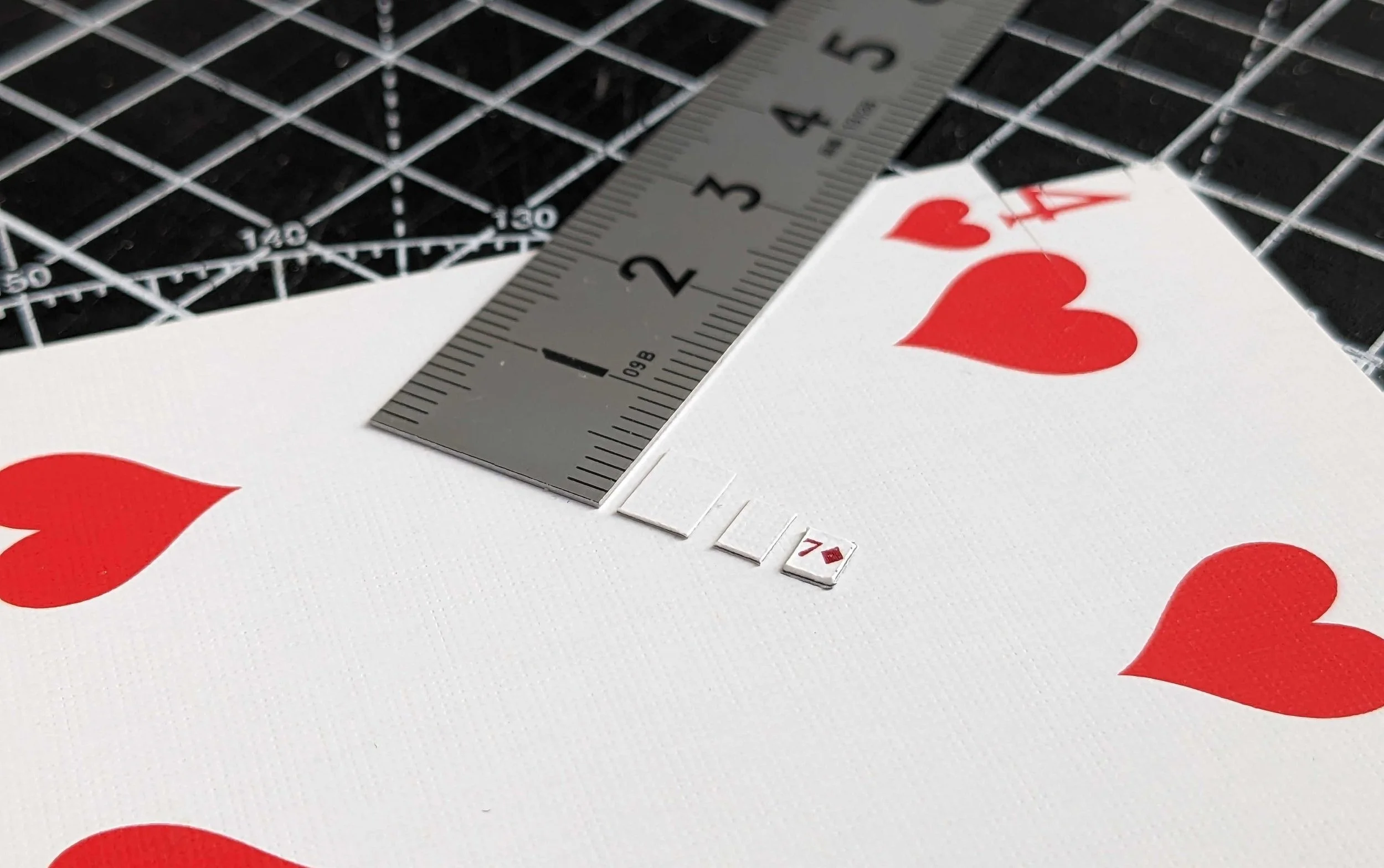Testing sizes for world's smallest playing cards