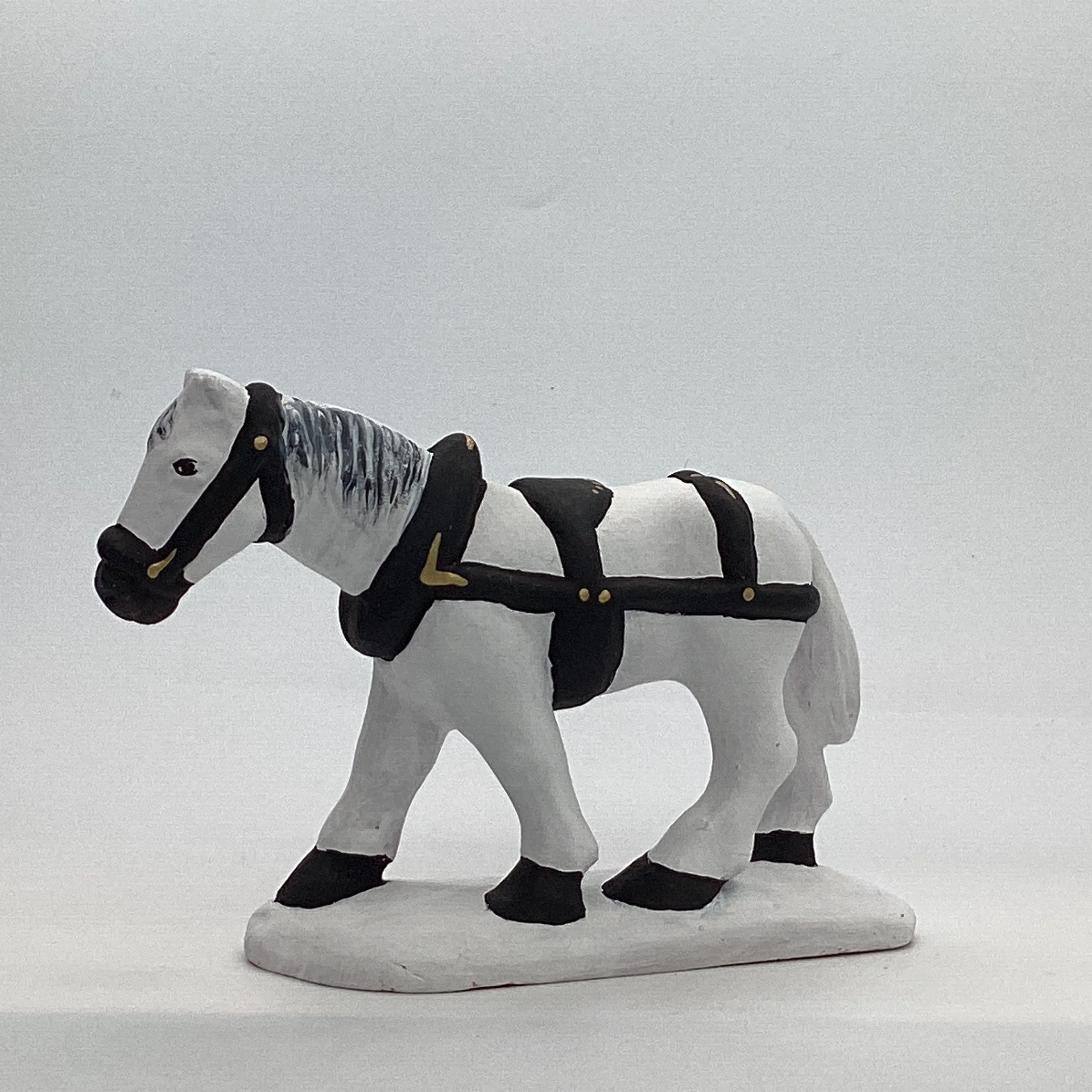 Cheval attelé