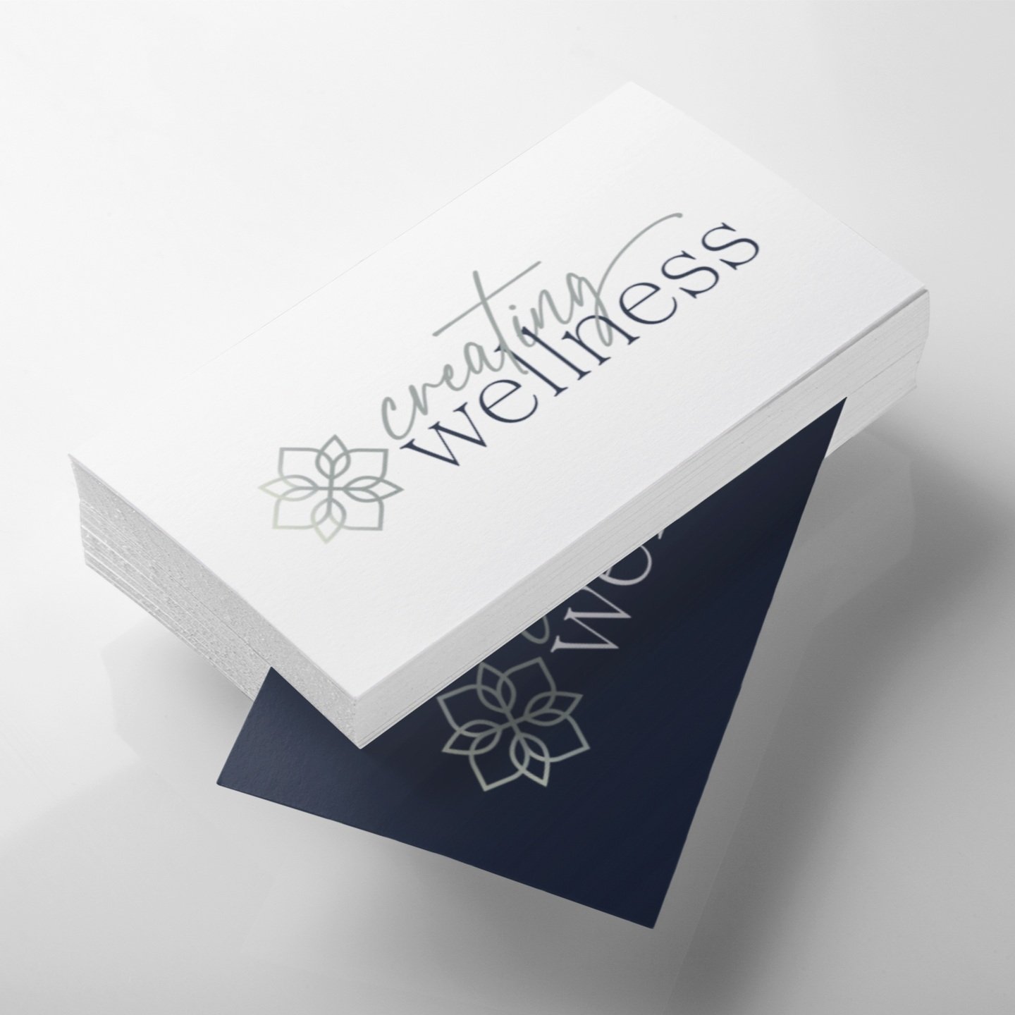 mockup-featuring-a-stack-of-business-cards-lying-over-a-smooth-surface-a6303+%281%29.jpg
