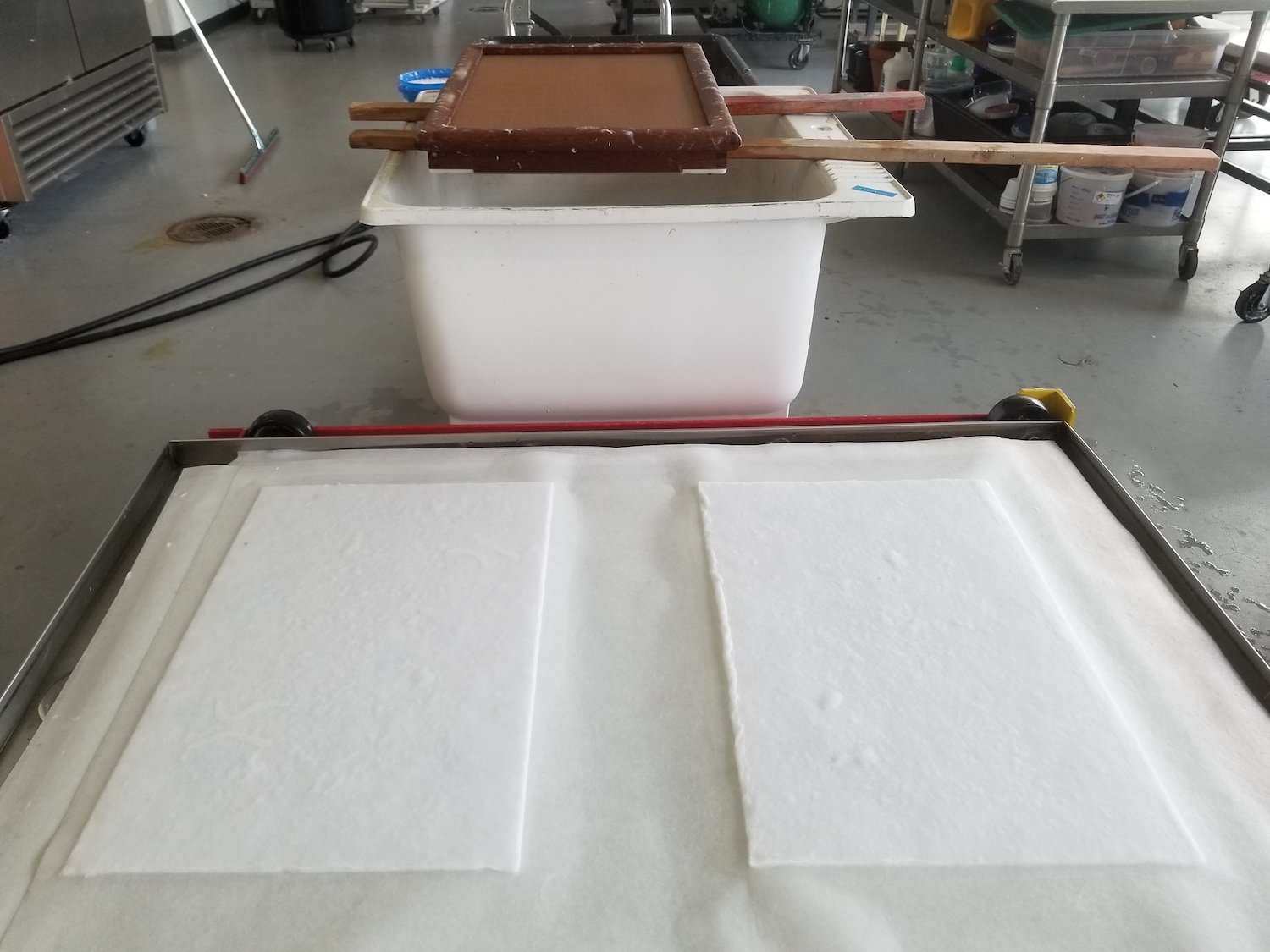 Paper sheets made from inherited bed linens at Longwood University
