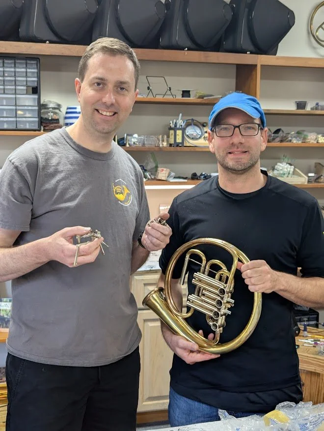Jacob (left) and Keith (right) brainstorming new ideas at the Medlin Horns workshop