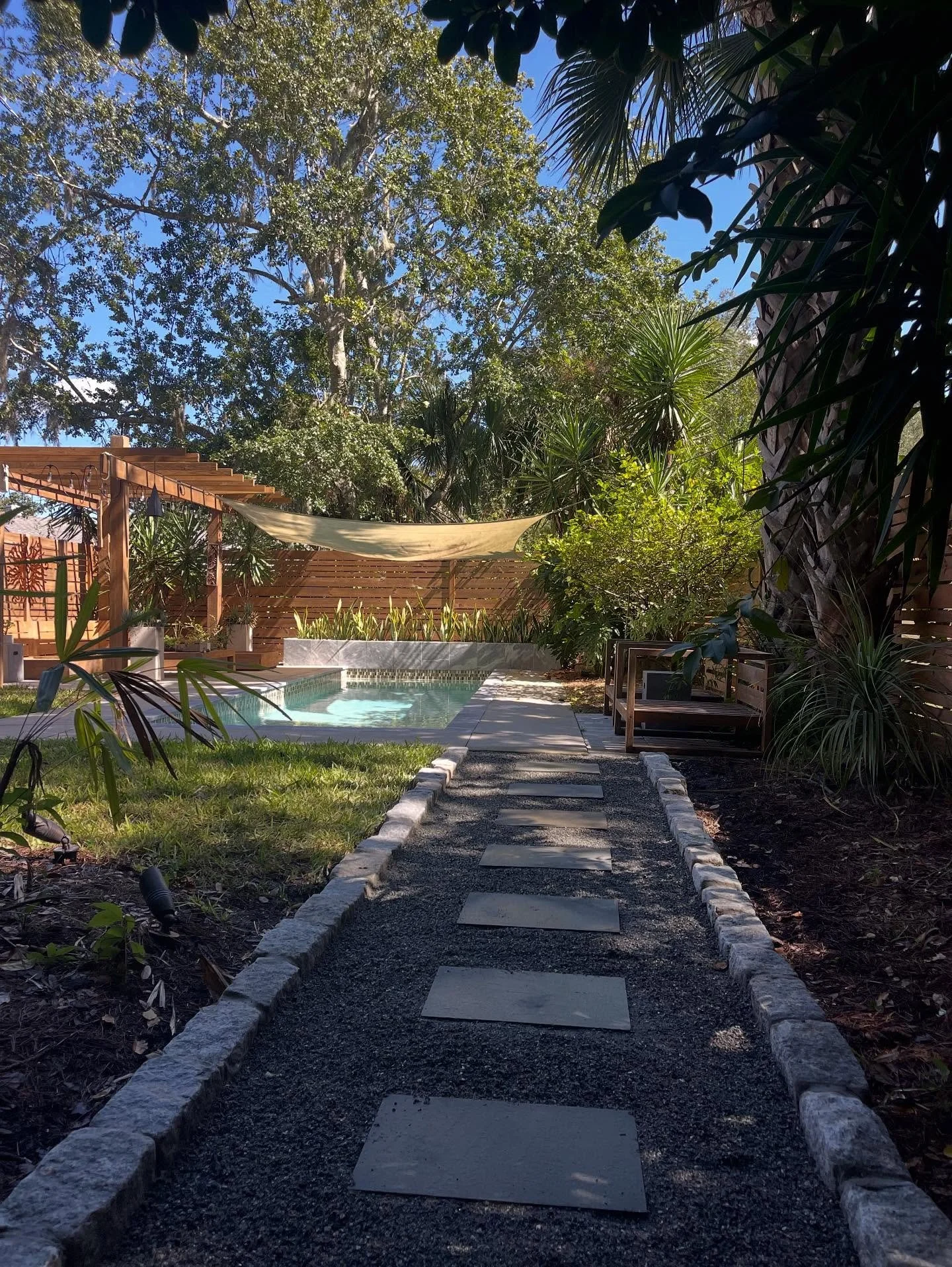 Putting the final touches on our beautiful Ortega project. This mid century tropical garden just got a major upgrade with new hardscape and lush plantings. Flip through the pics to see the transformation! #landscapetransformation #landscape #landscap