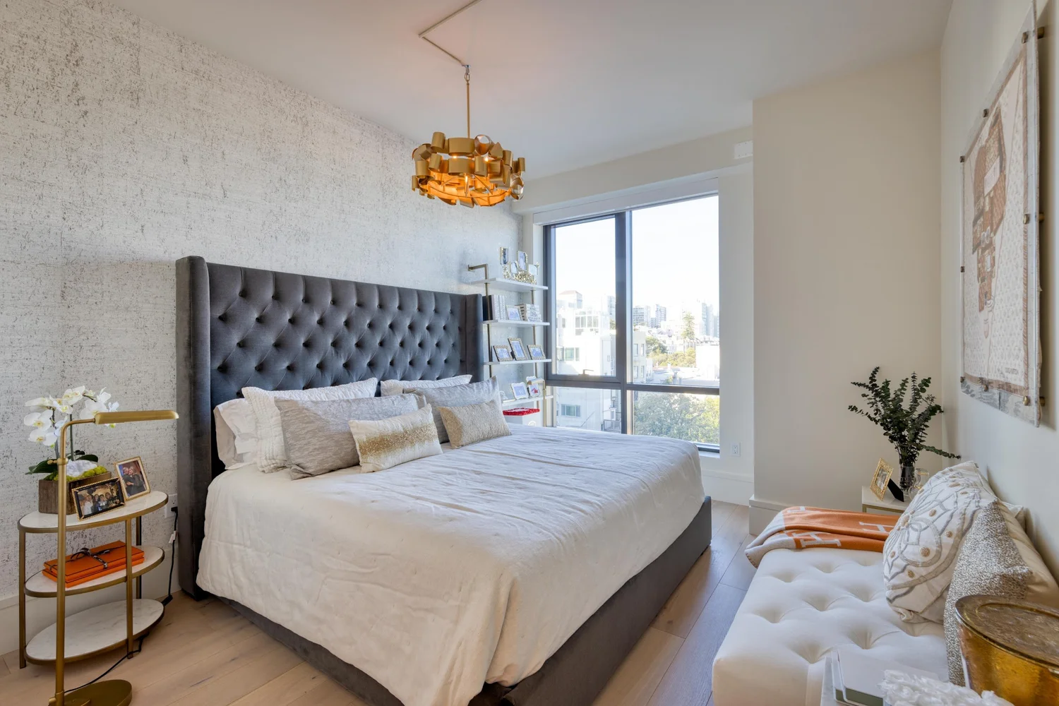 1515 Union St #5C — primary bedroom with tufted headboard