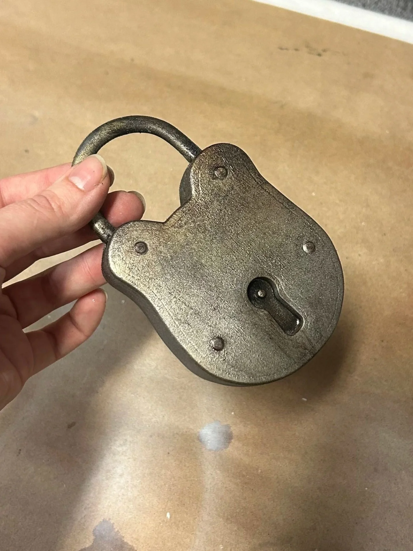 mouth padlock (molded plastic, spray paint, pacifier mouthpiece on back)