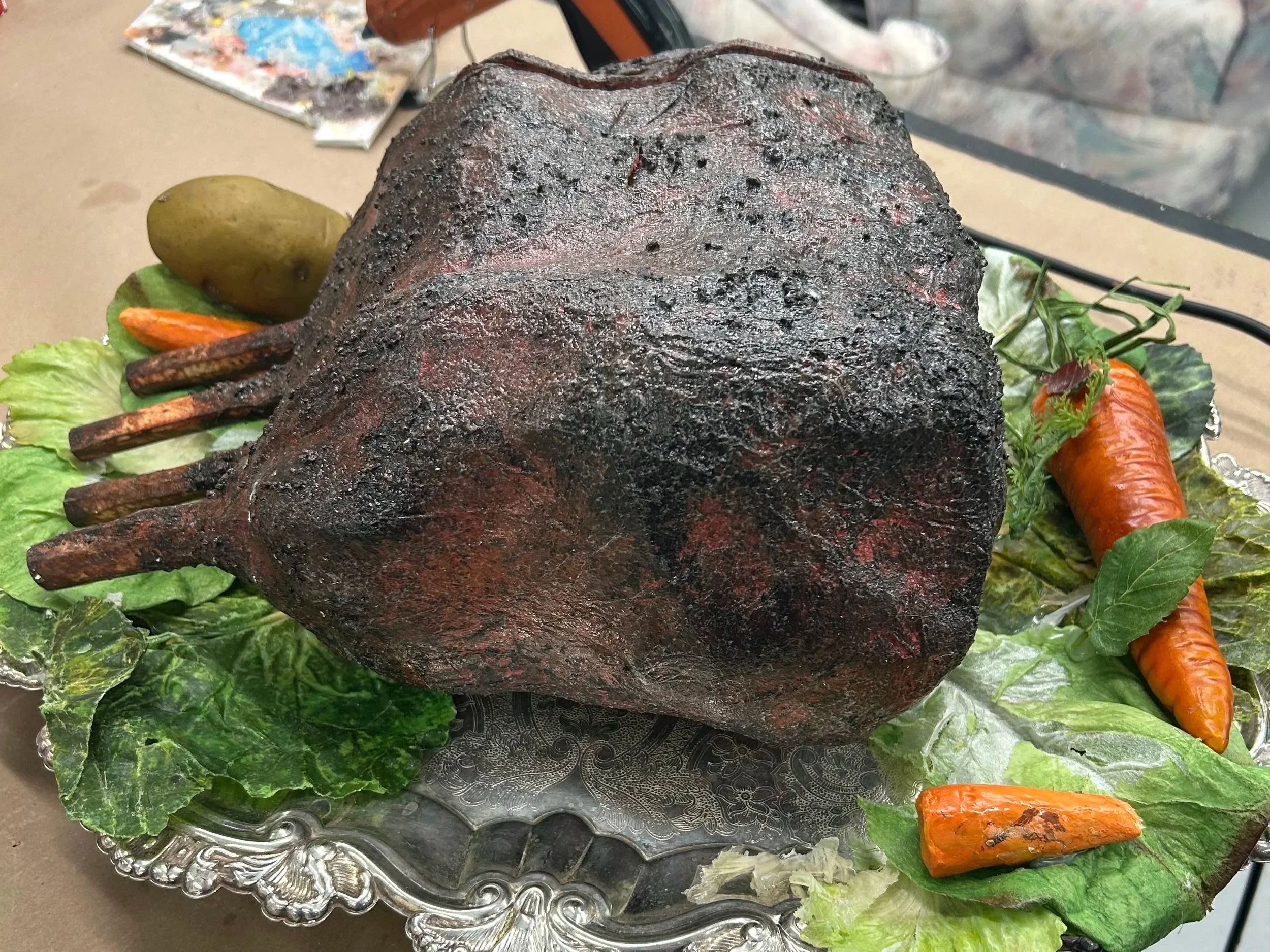 Stab-able, sliceable roast (upholstery foam, styrofoam, tissue paper, crystal gel, resin bones, muslin, velcro)