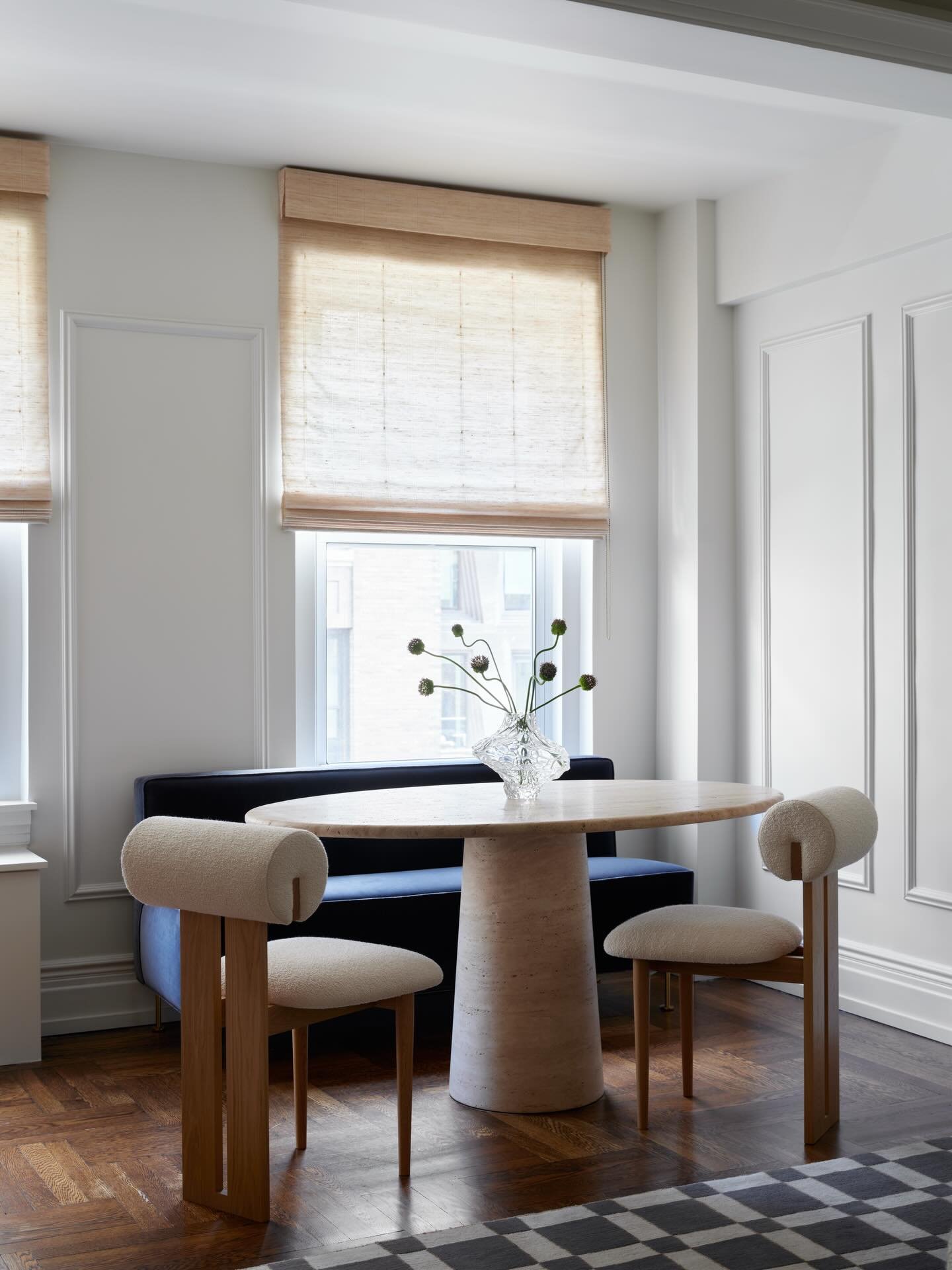 A lesson in tension: Warm meets cool, new meets old, and sculptural meets structural in the living/dining room of our Gramercy project.