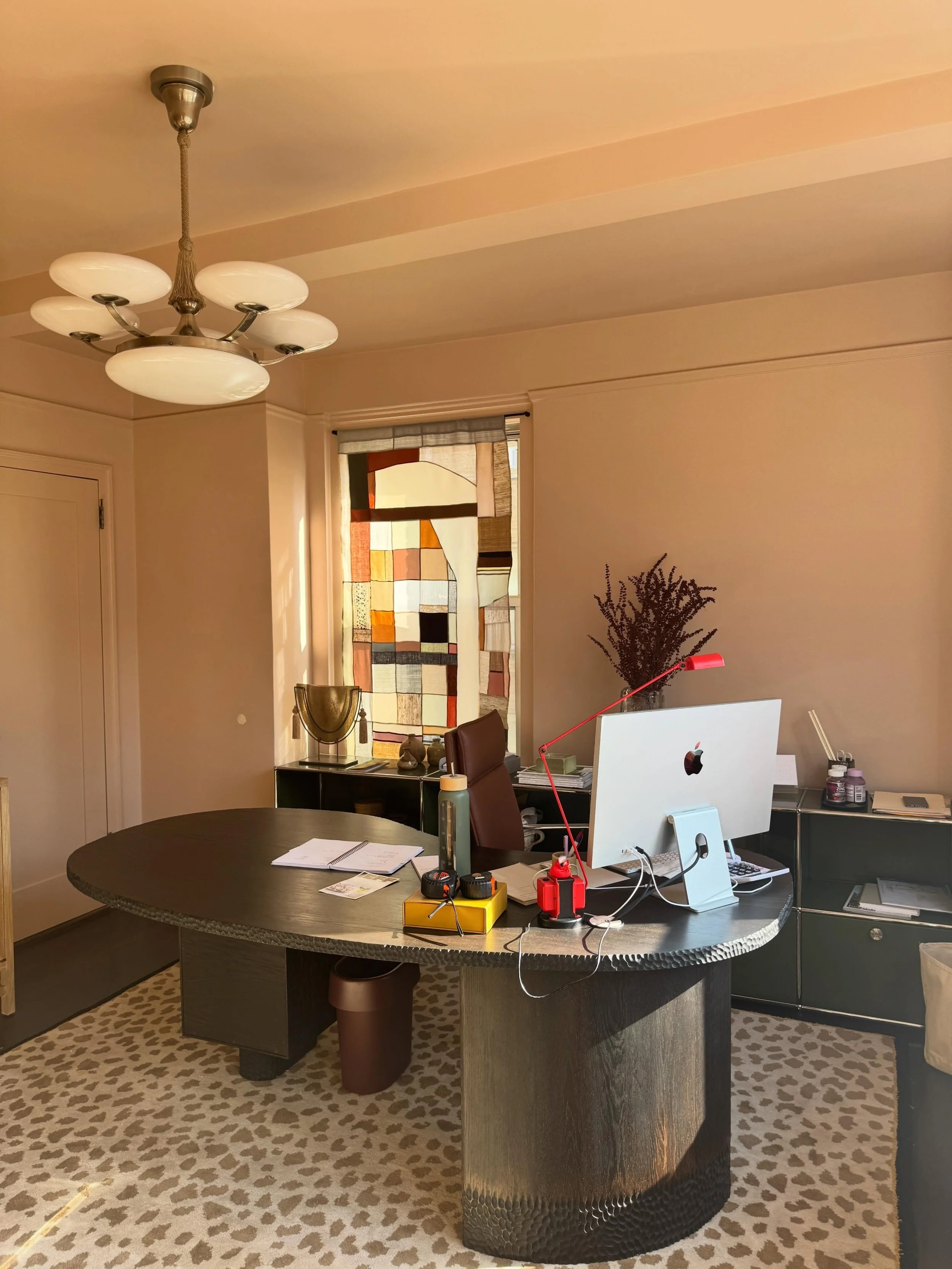 A working studio, a personal archive, a layered moodboard in motion. Rachel&rsquo;s office has been curated to reflect her approach as a designer &mdash; thoughtful, collected, quietly playful. A USM sideboard anchors the room beside stacks of Archit
