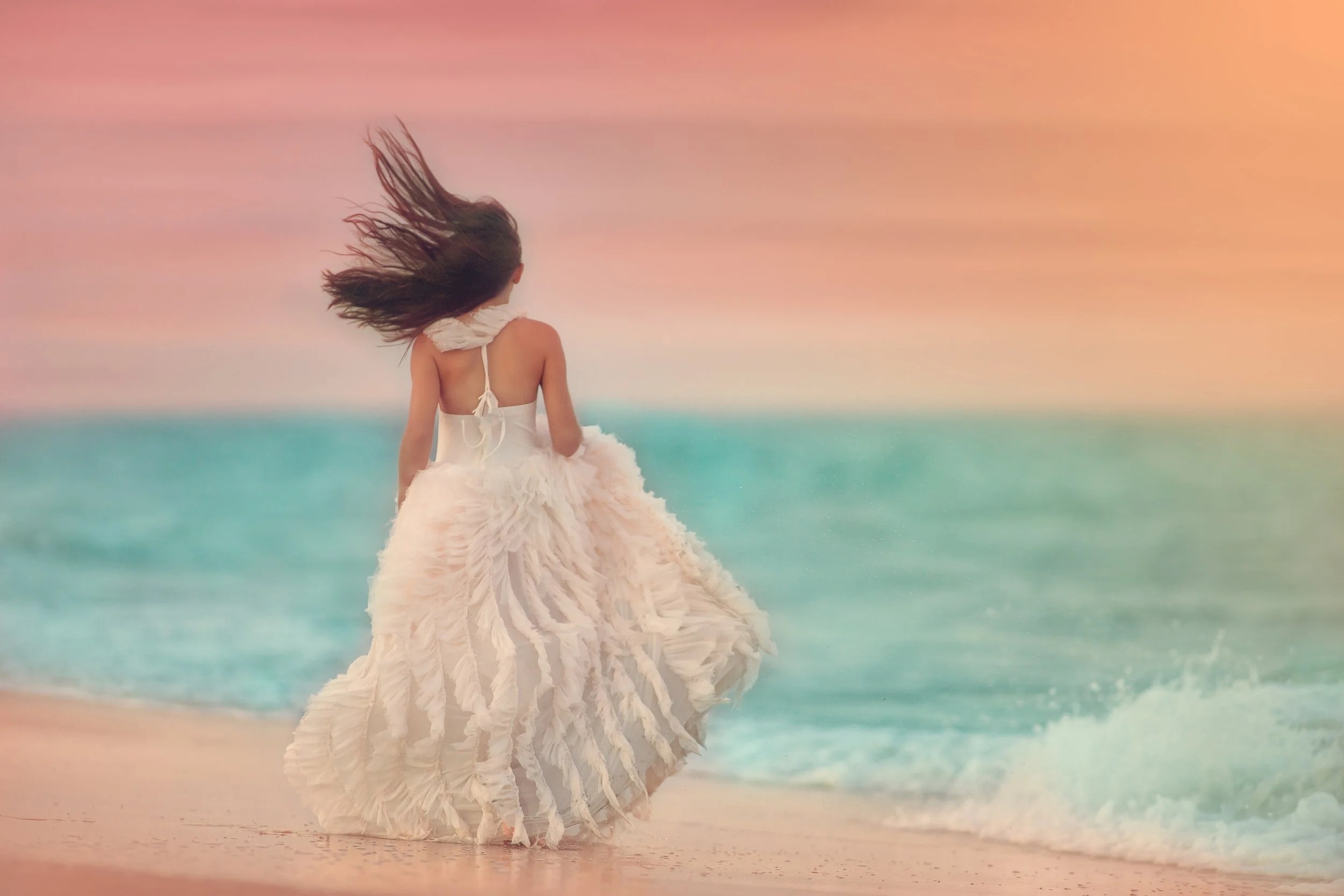teen fine art portrait at the beach featuring flowing gown and natural movement in South Jersey