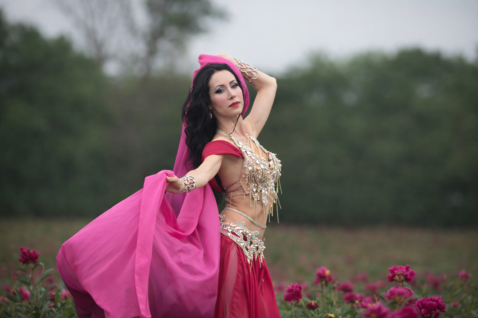 creative portrait session surrounded by blooming peony flowers in New Jersey