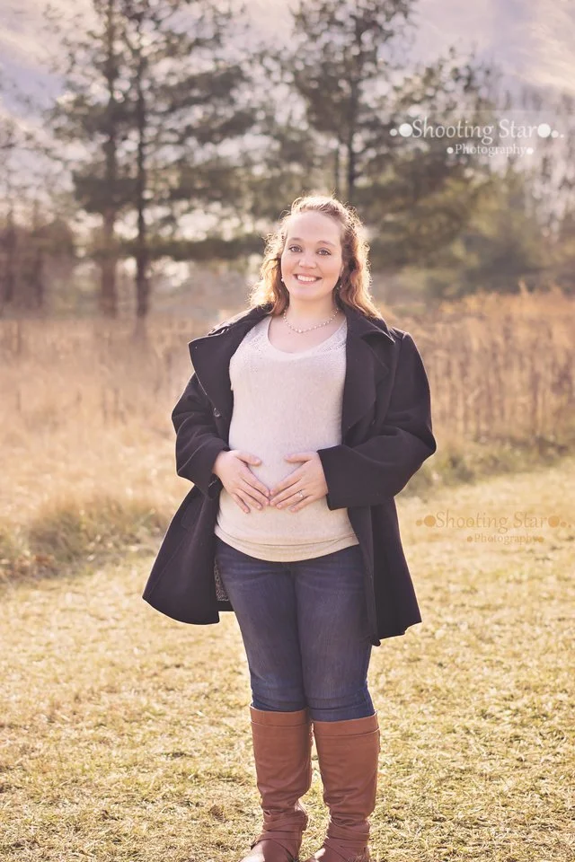 Pregnant mother spending time outdoors at the Deptford Wildlife Refuge in New Jersey.
