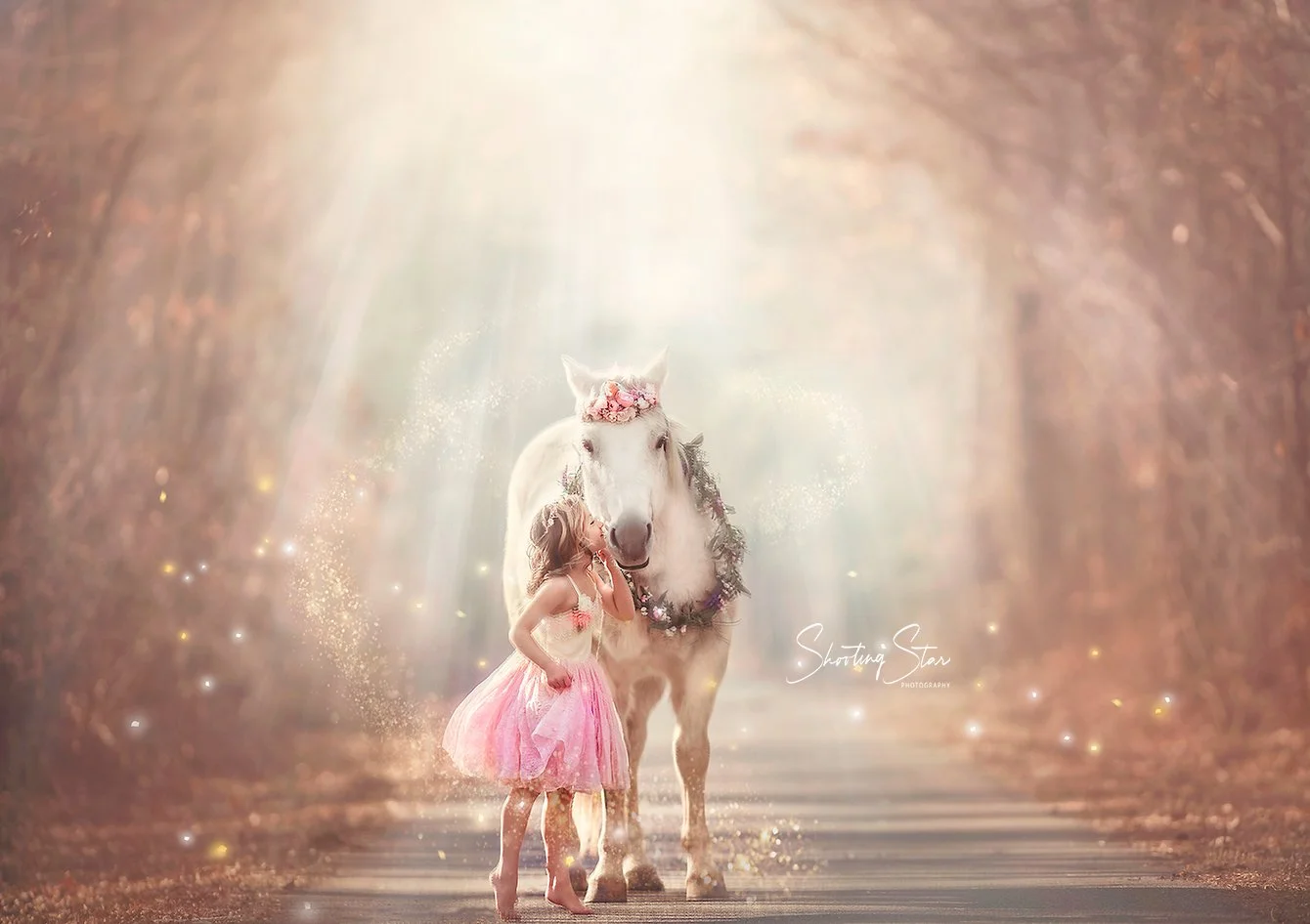 Young girl whispering into unicorn’s ear during private portrait session in South Jersey