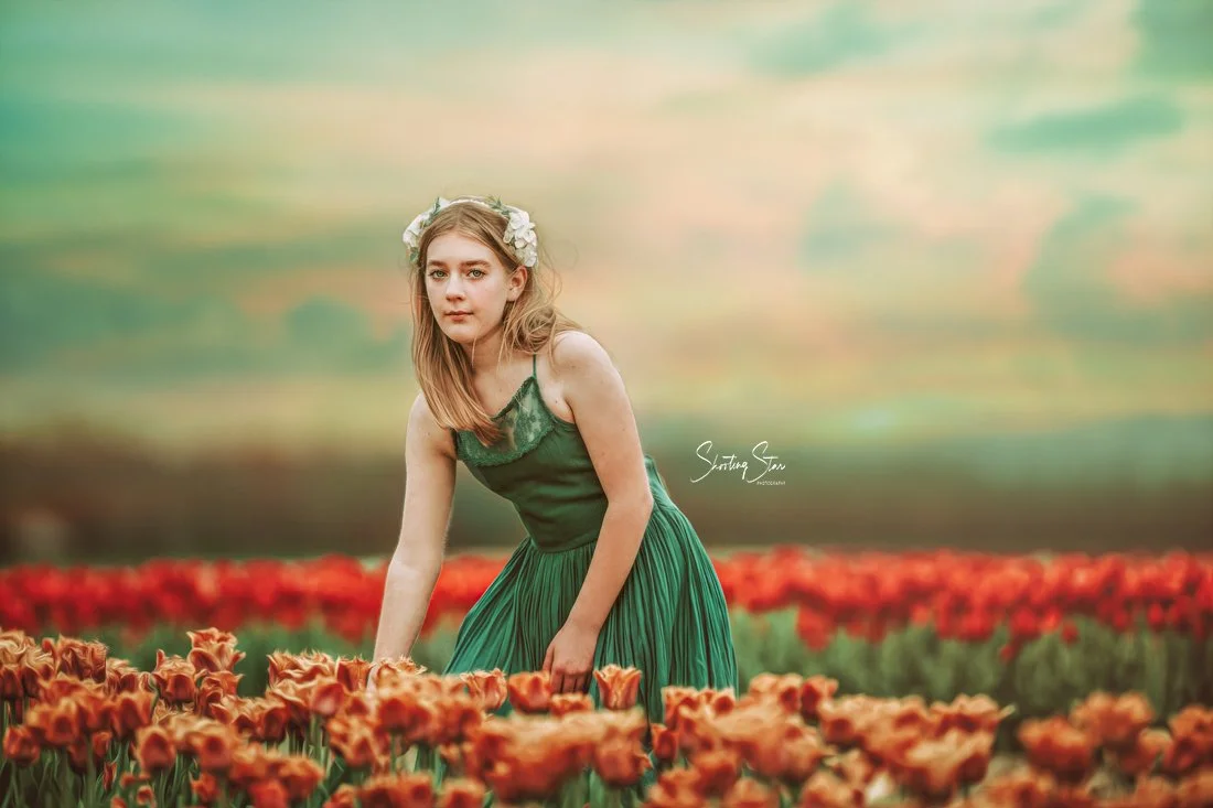 Girl picking tulips at Dalton Farms in New Jersey during a spring portrait session
