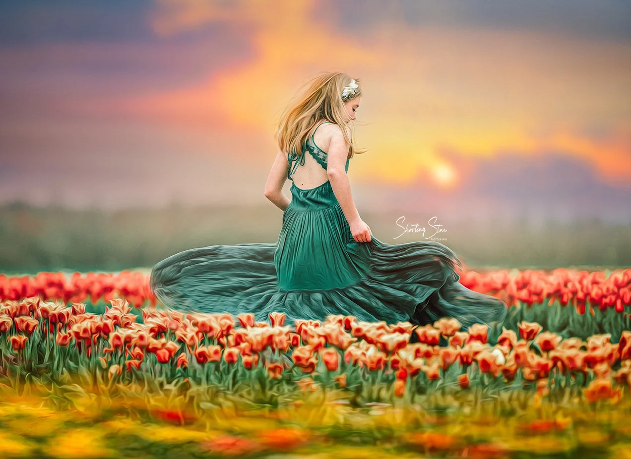 Girl twirling in a tulip field at Dalton Farms in New Jersey during a spring portrait session