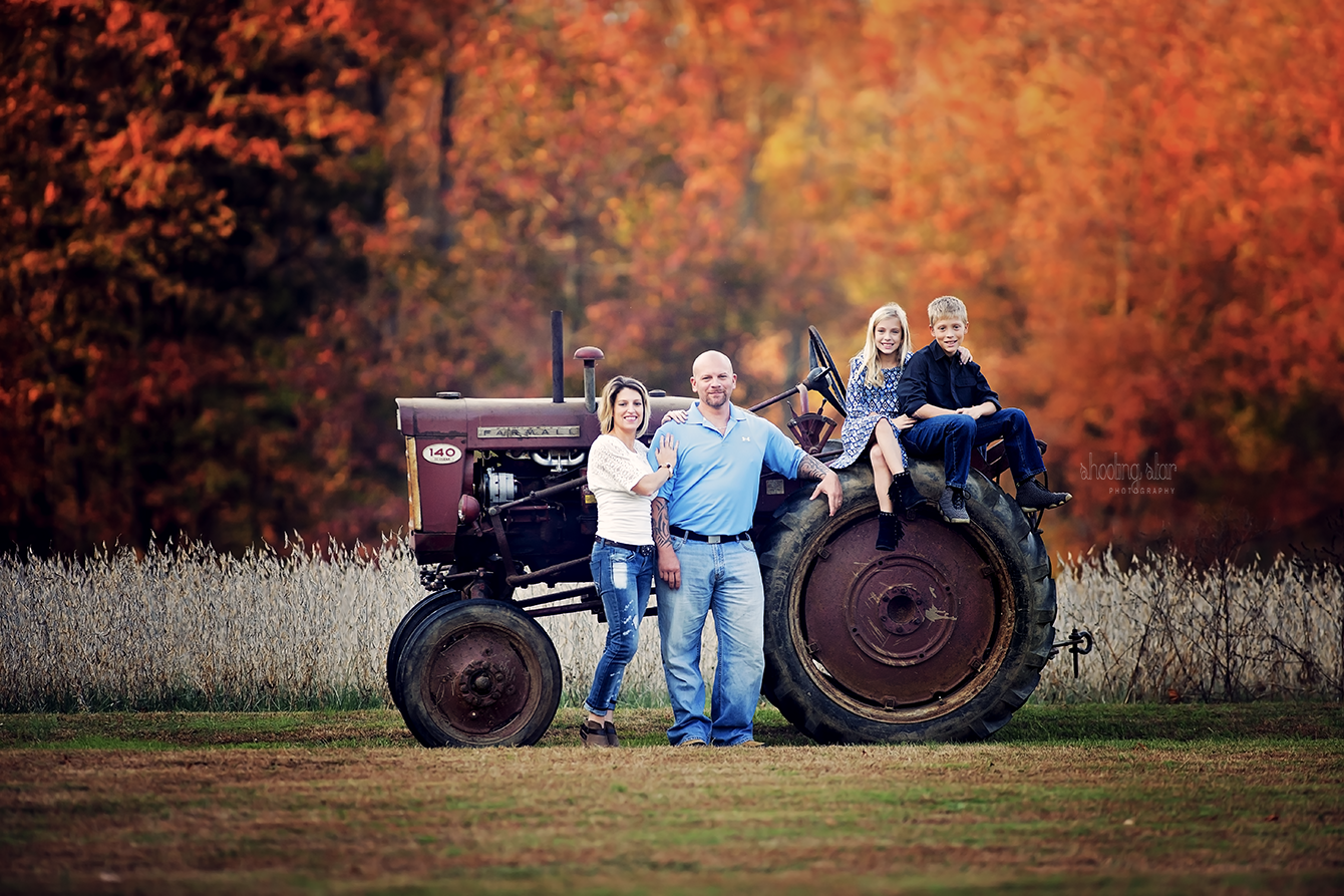Family portrait with vintage tractor during a Gloucester County, NJ session.