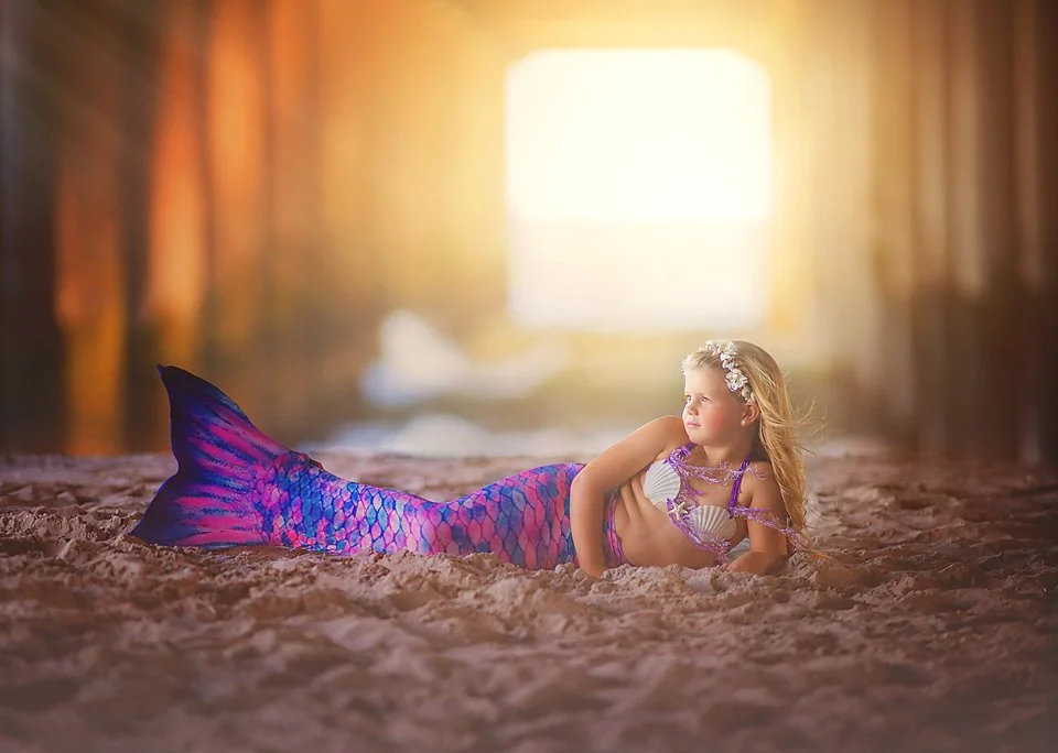 blonde-mermaid-gazing-ocean-beach.jpg