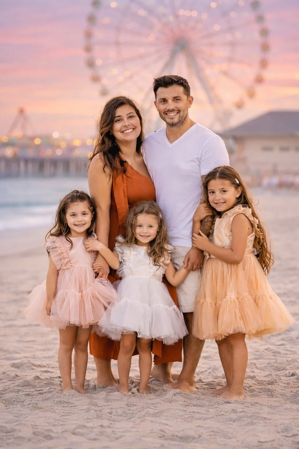 Happy Valentine's Day!!! This is the kind of image that makes families say, &ldquo;I&rsquo;m so glad we did this.&rdquo;

Soft pink skies. Warm sand. The Ferris wheel glowing behind you. Your babies still small enough to hold your hands.

If a beach 