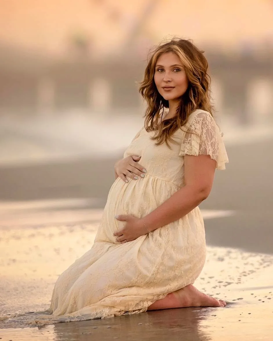 Radiant and glowing mama-to-be on the beach.  Beautiful couple from Ohio on their Baby moon :)