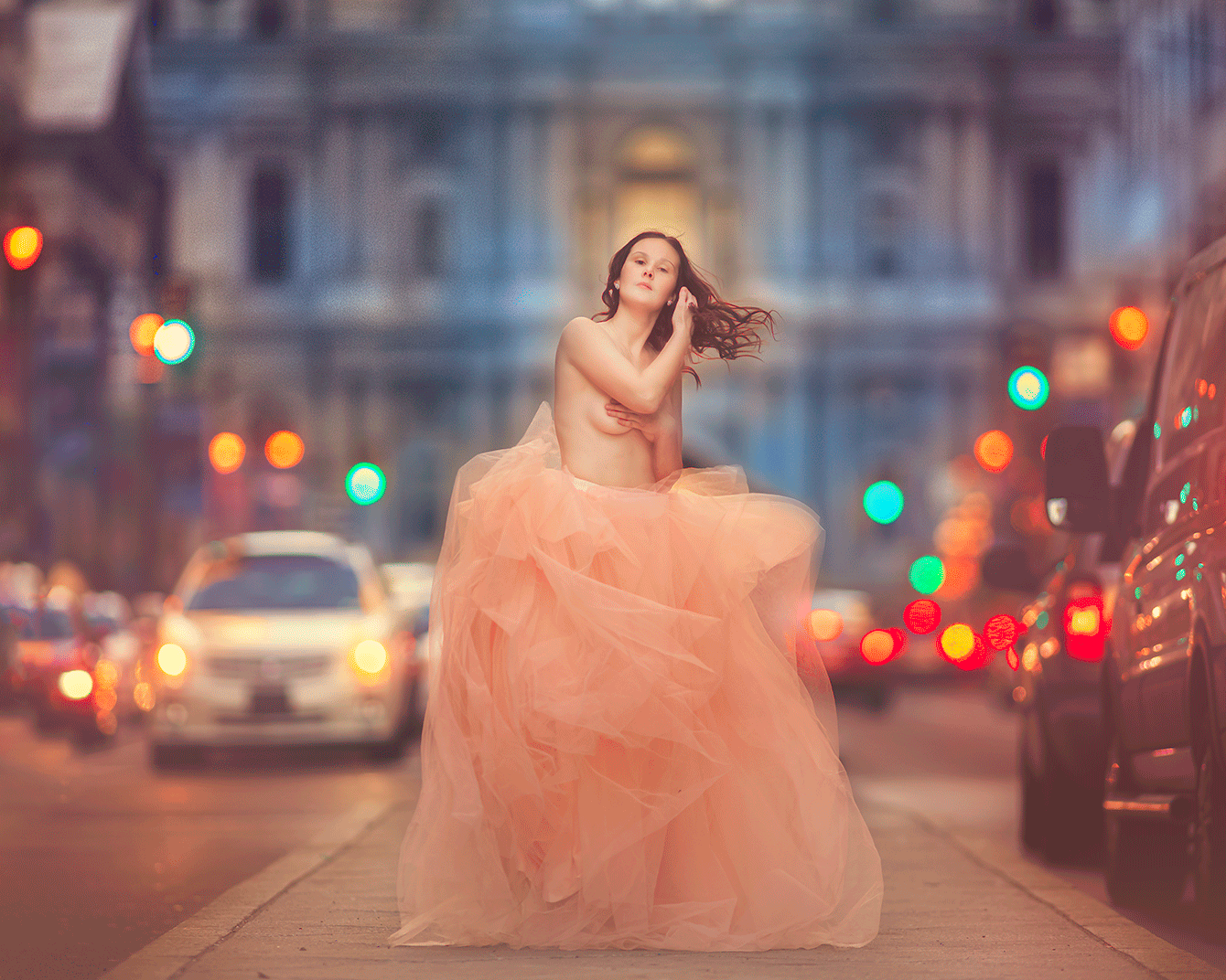 Fine art maternity portrait of an expecting mother in a flowing white gown photographed in New Jersey