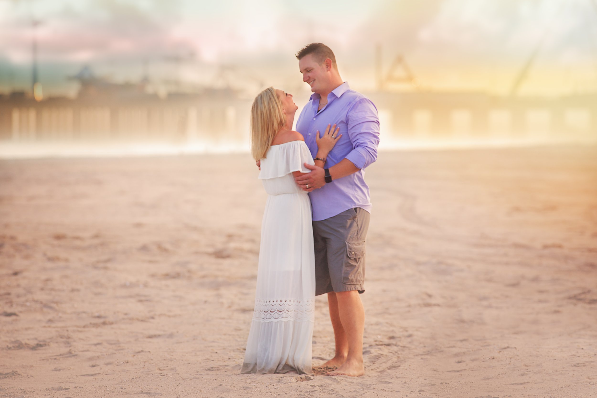 Soft, romantic beach couples portrait capturing a peacefulmoment by the water in Atlantic City, New Jersey