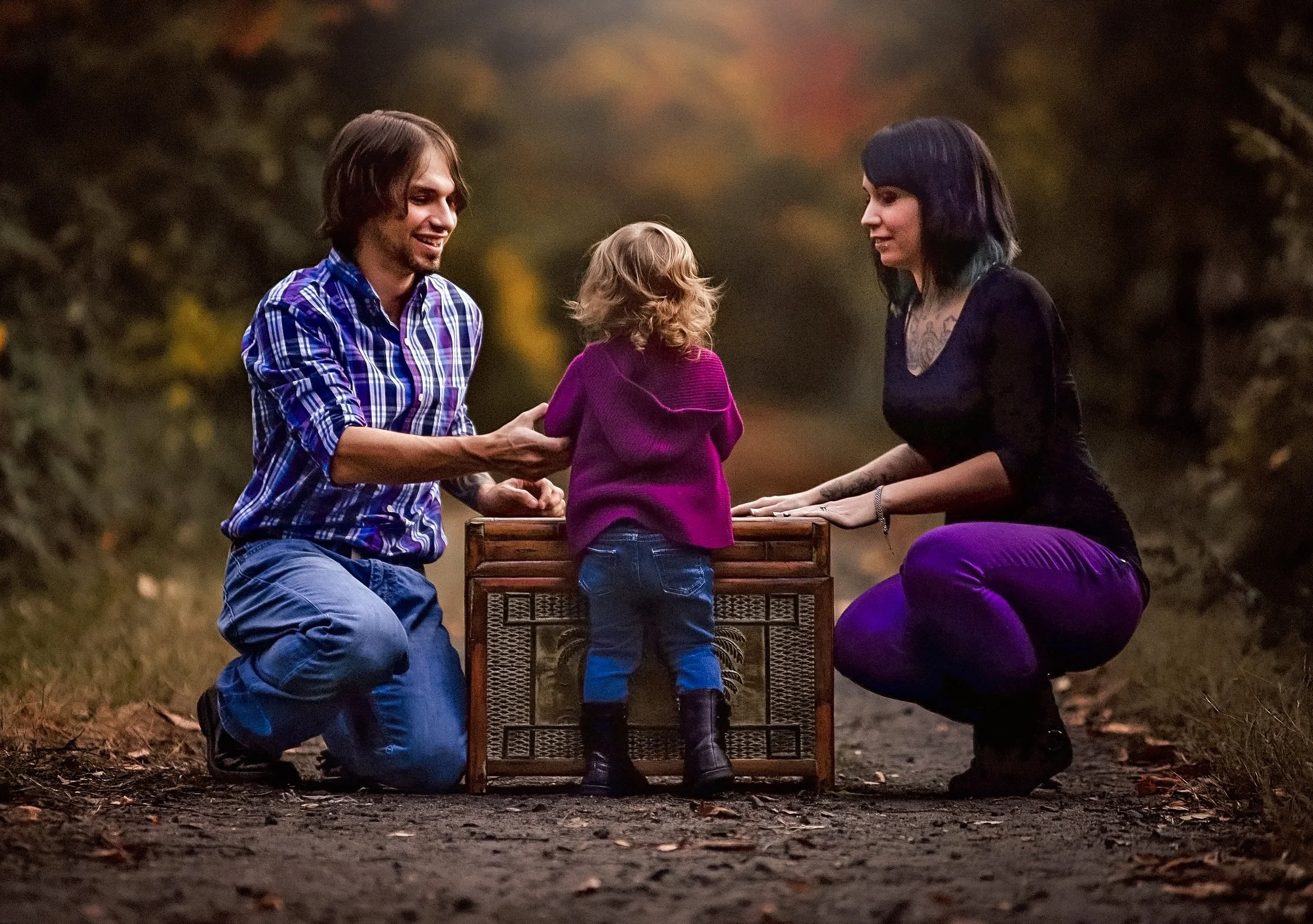 parents interacting with toddler during family portrait session in South Jersey