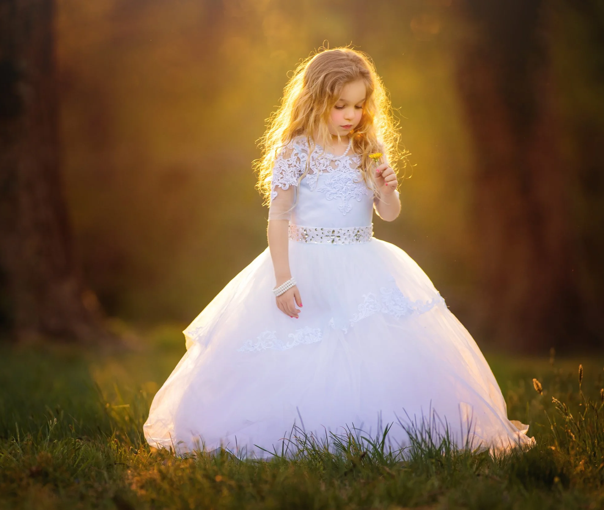A child photographed in natural light during a relaxed family mini session.