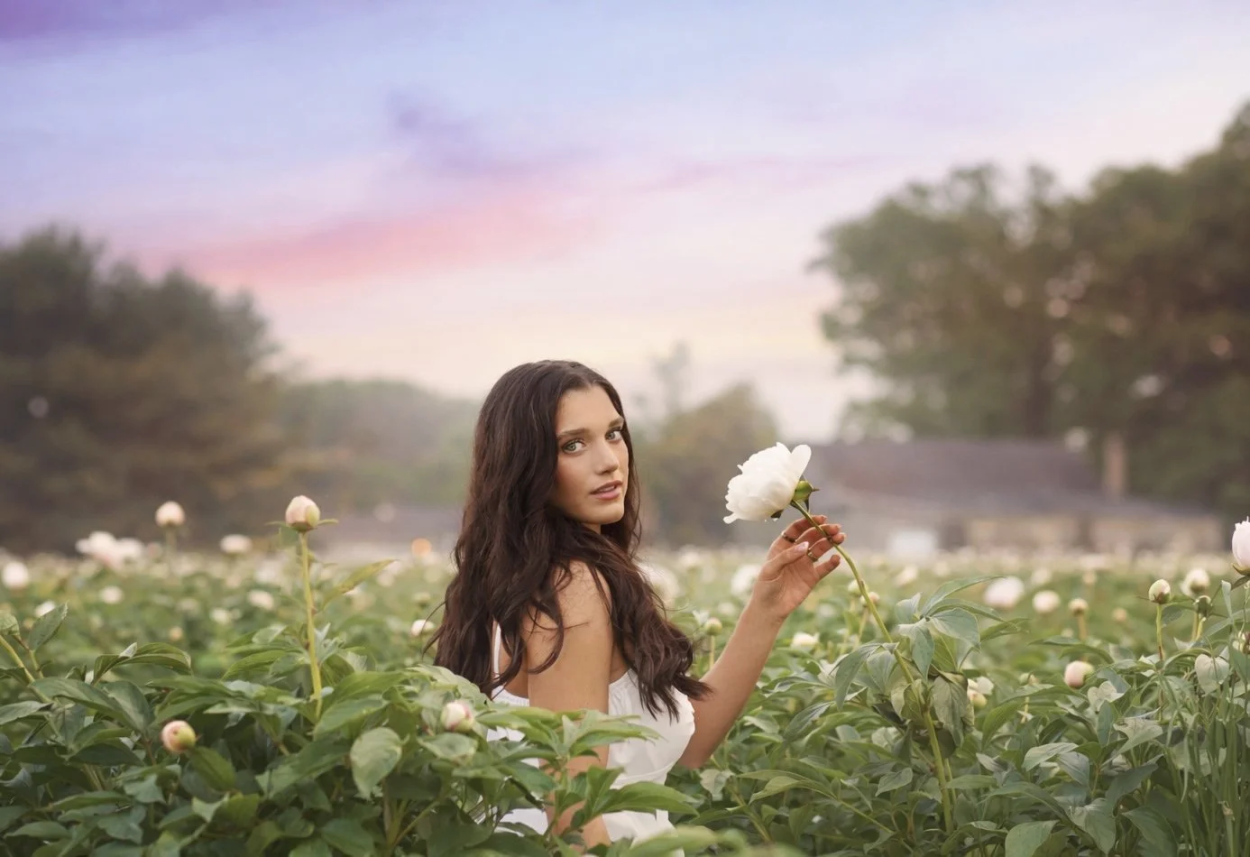 senior portrait session in blooming peony garden in South Jersey