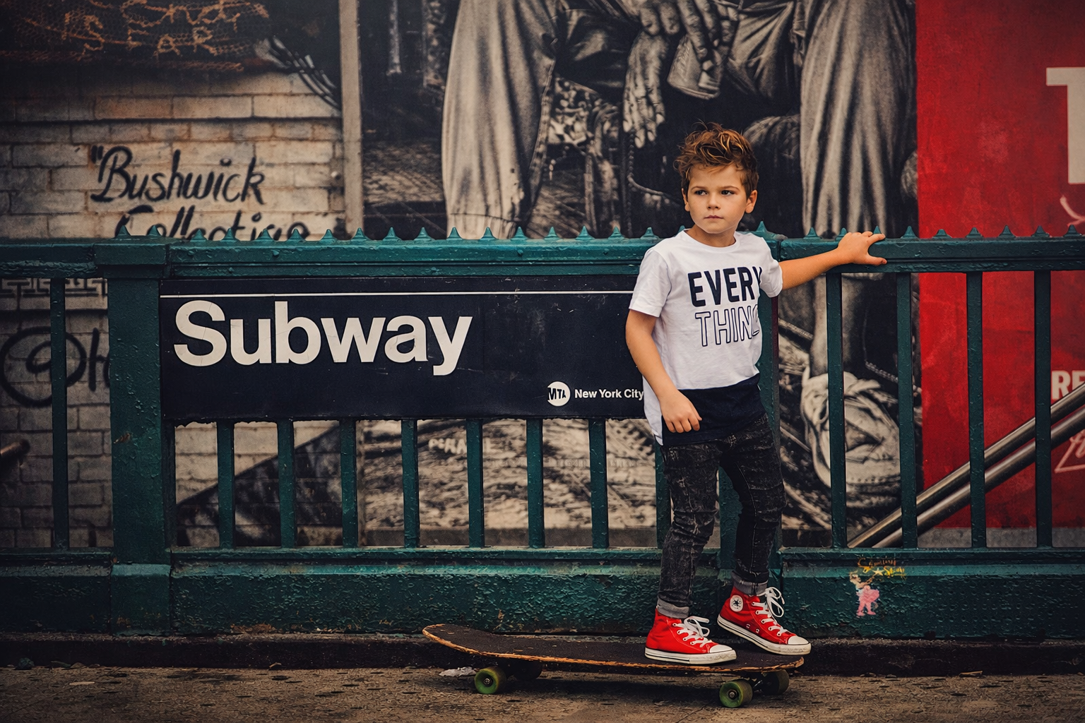 Child on a skateboard photographed during a family photography session in Philadelphia.