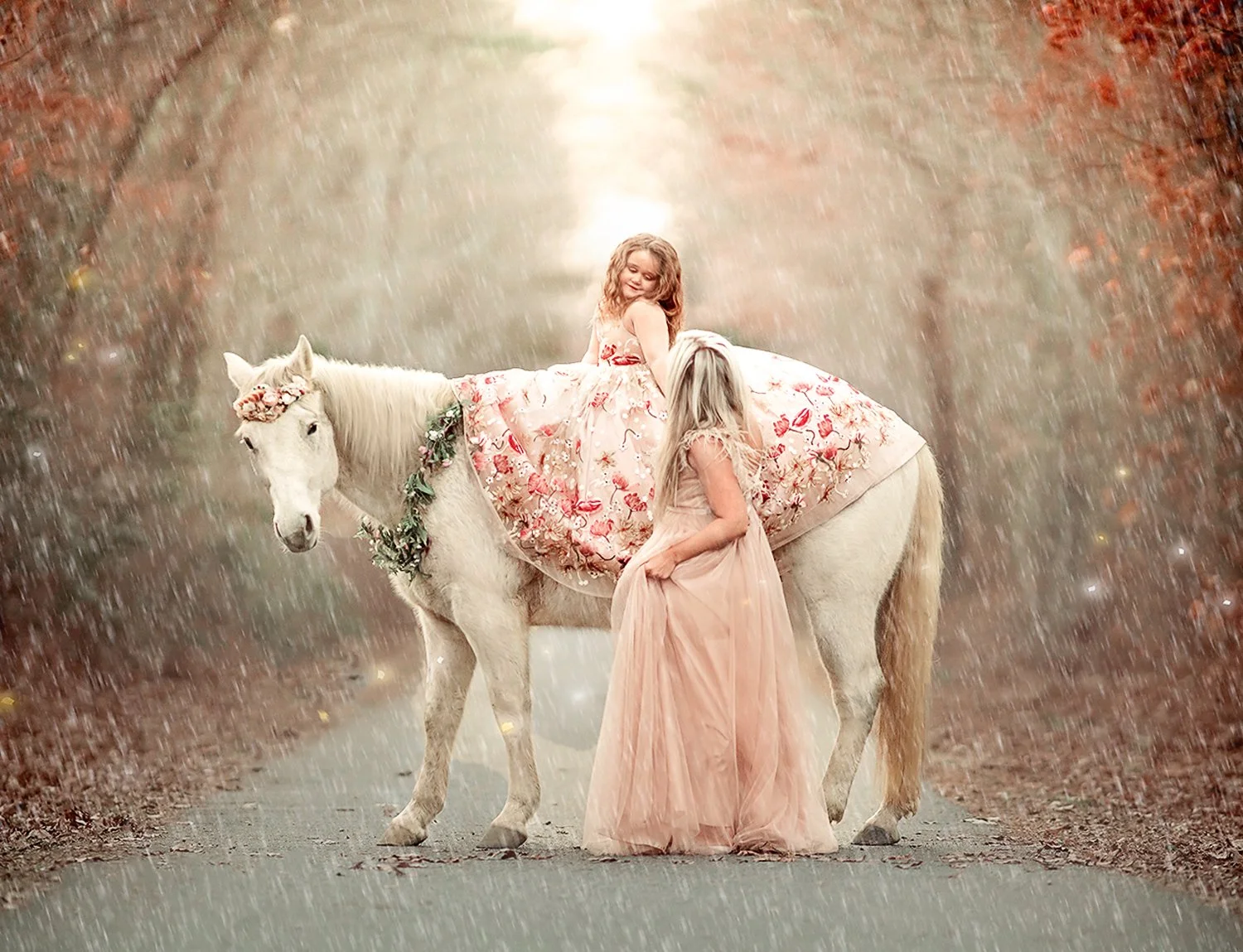 A mother and daughter looking at each other while posing with a unicorn during a winter unicorn portrait session, sharing a quiet, meaningful moment.