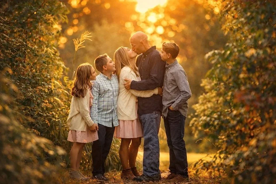 Family portrait at sunset in a forest setting in Glassboro, NJ.