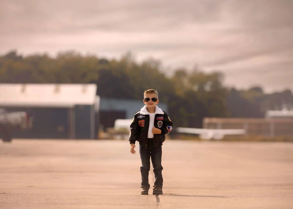Child standing on runway during aviation photoshoot near Cape May New Jersey