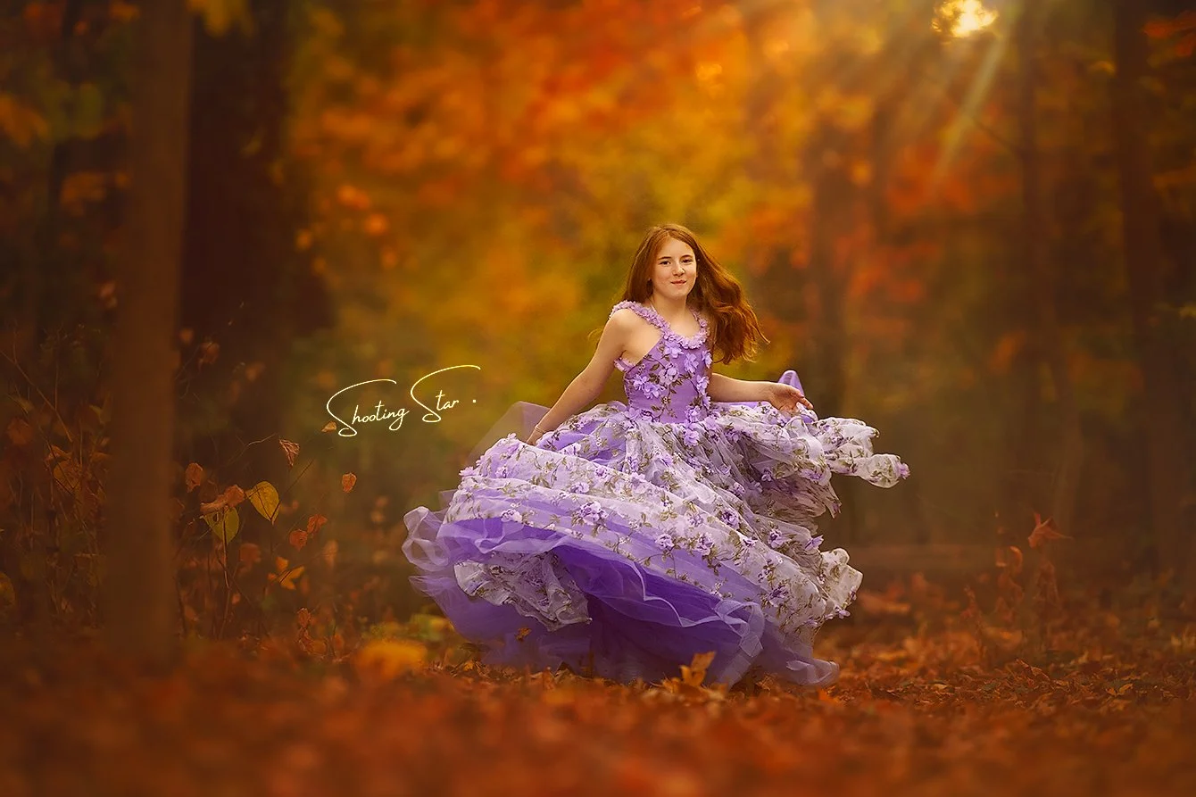 Child running through fall leaves during a family photography session in Haddon Heights New Jersey