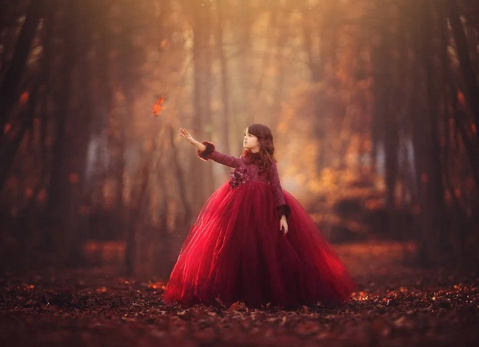 Child portrait in a forest setting with soft natural light, fine art outdoor photography