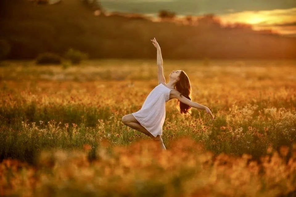 Fine art summer portrait of a child in a white dress captured in soft natural light in New Jersey