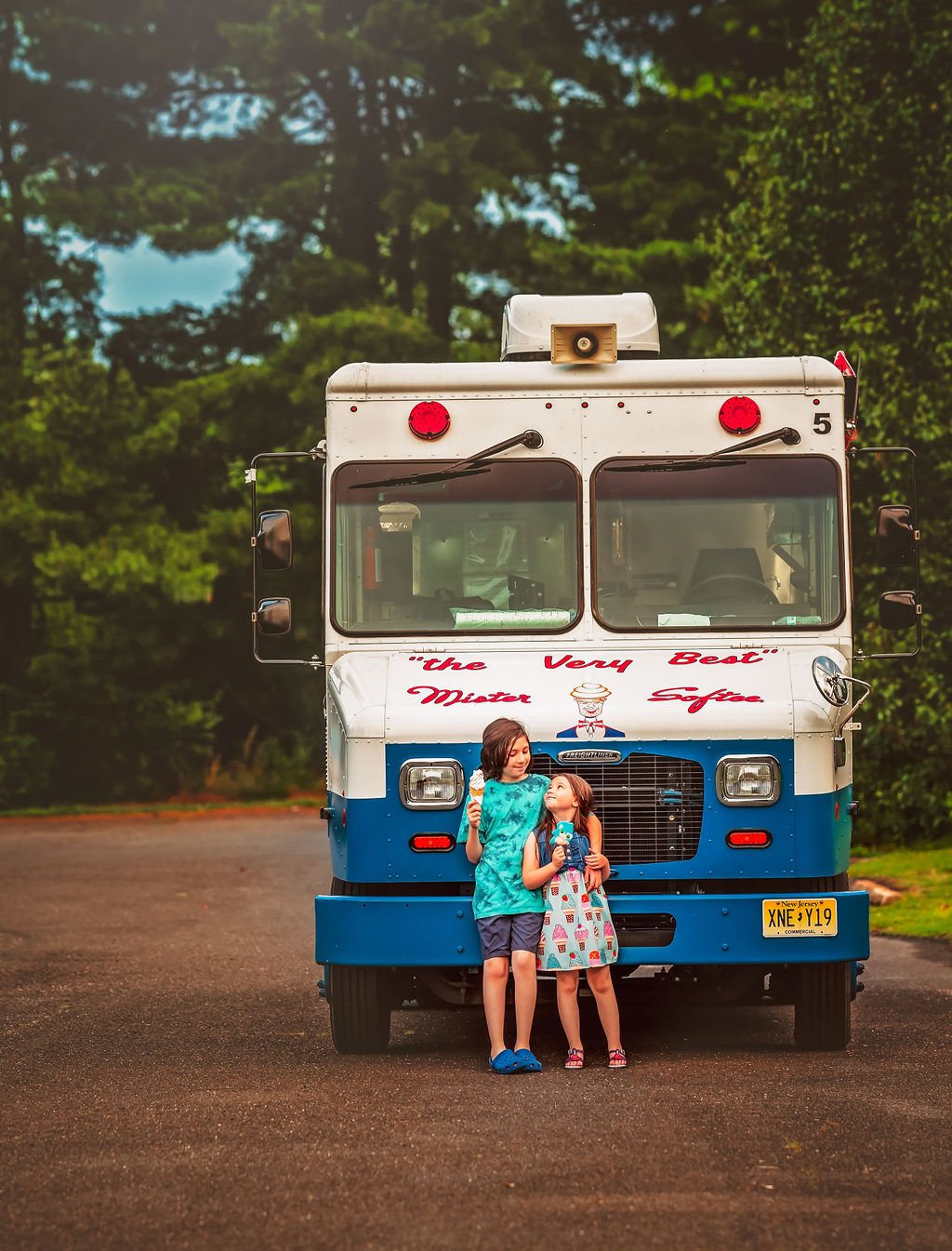 Brother and sister sharing a tender moment while enjoying their ice cream in Sewell, NJ.