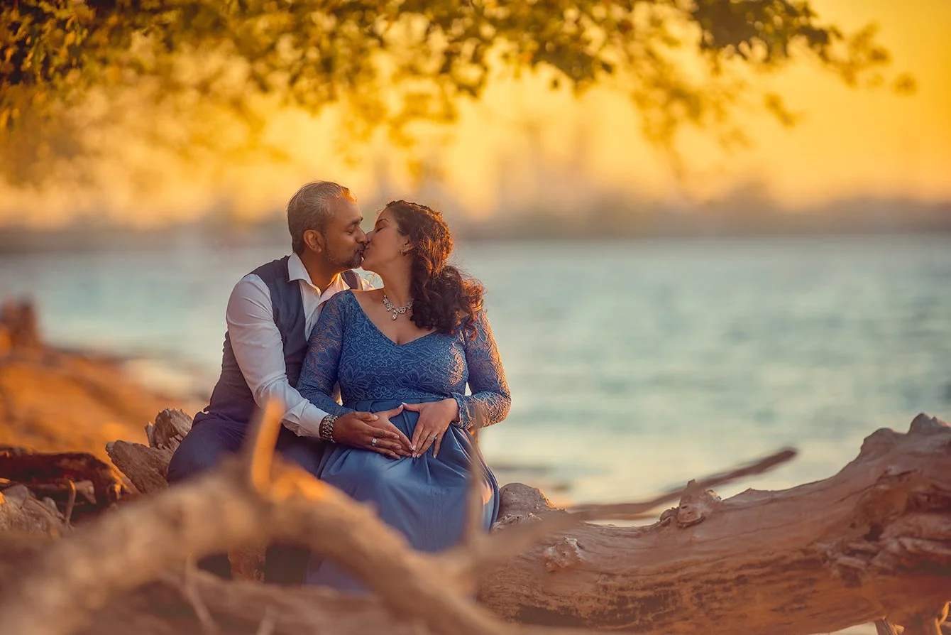 An intimate maternity portrait capturing the emotional connection between husband and wife at Palmyra Cove
