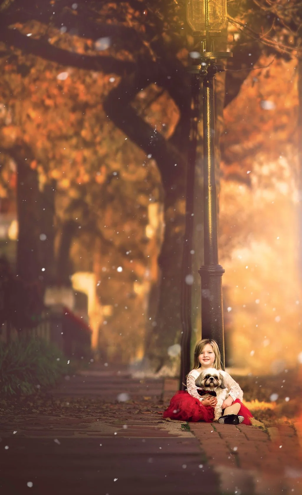 Child standing near a historic gas lamp during a Cape May portrait session photographed by a South Jersey photographer.