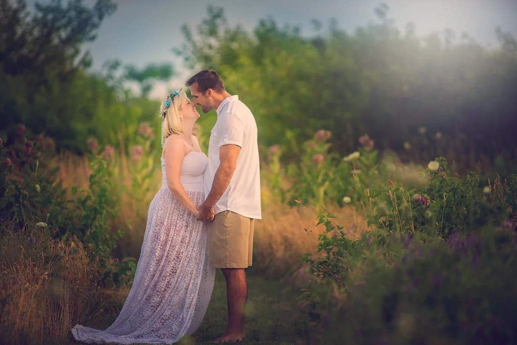 expecting parents embracing during maternity portrait session in New Jersey