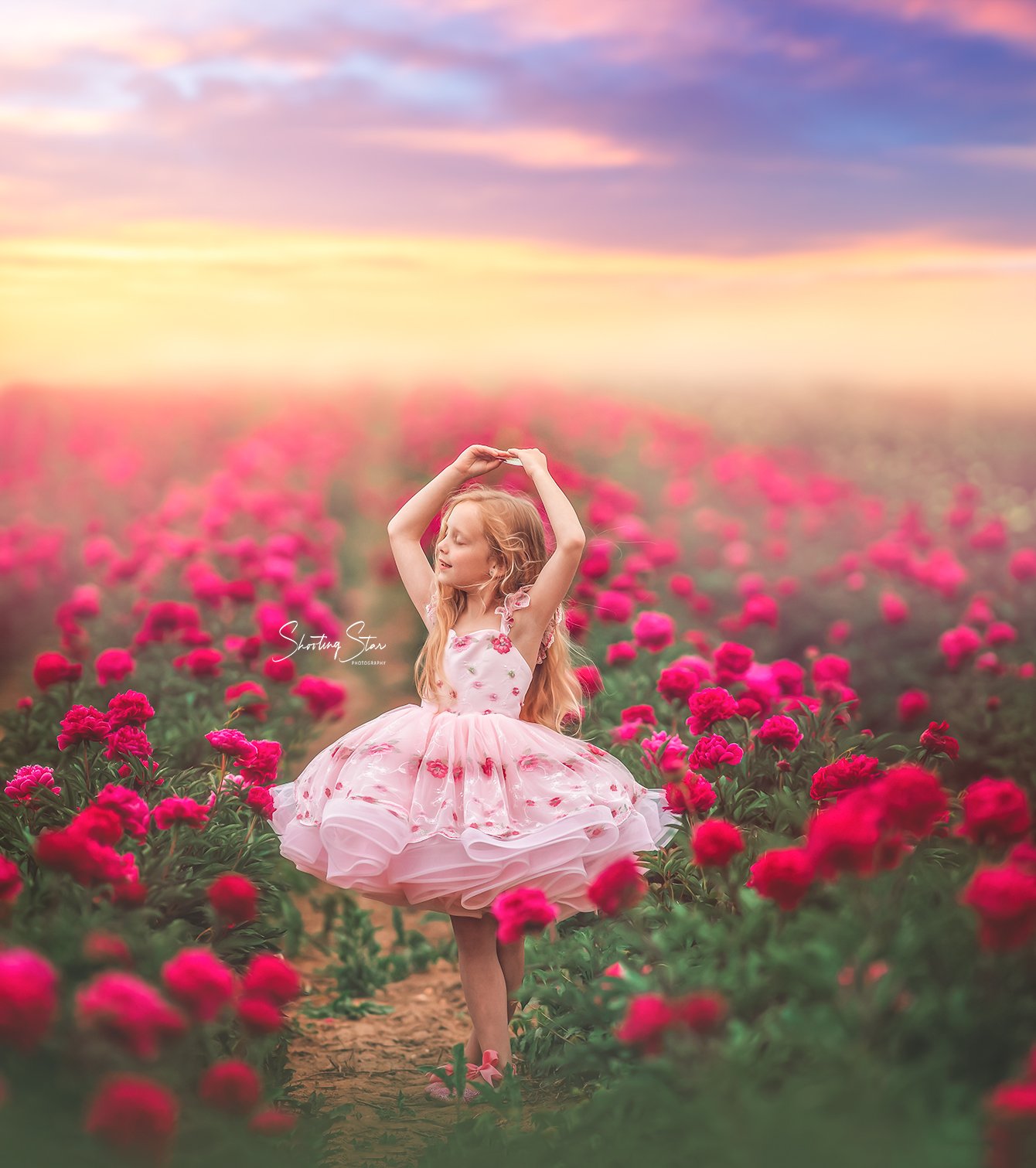Girl dancing in sunset field during South Jersey portrait session